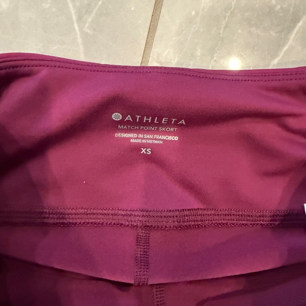 Athleta, Momentum tennis skirt. Size XS. Magenta. Worn once! Length approx 15in - Picture 2 of 3